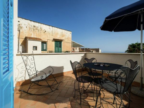 Отель Tasteful holiday home in Santa Flavia with terrace  Санта Флавиа